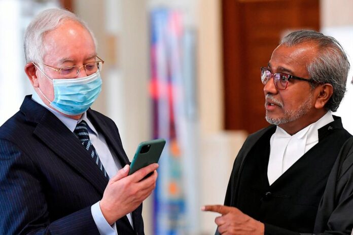 Shafee Abdullah, lawyer for Najib Razak, suggests a three-member bench for SRC International corruption review while objecting to presence of Court of Appeal judge Najib talk with Shafee malaysia latest news sport news malaysianews.my
